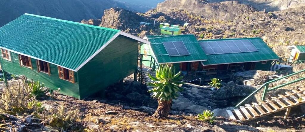 Camping in the Rwenzori Mountains Vs sleeping in huts: Camps, Prices, Trails