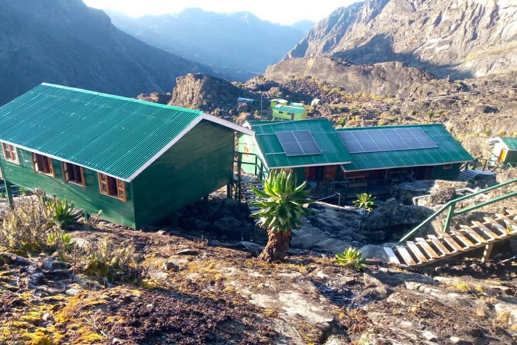 Camping in the Rwenzori Mountains Vs sleeping in huts: Camps, Prices, Trails